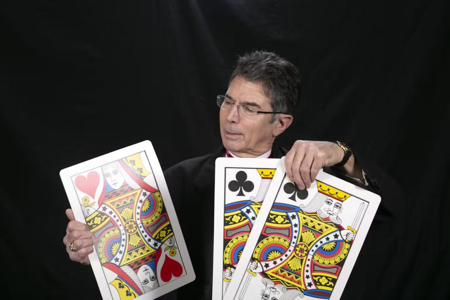 Ken Caplan presenting an oversized playing card routine